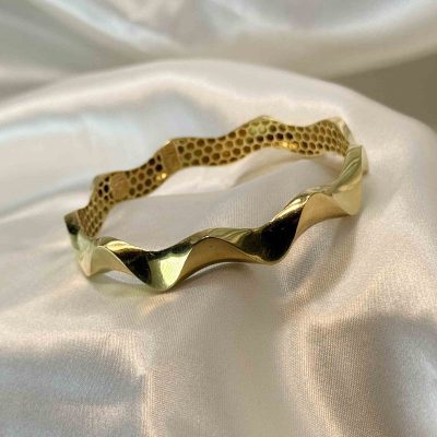 النگو طلا مدل موج بدون اجرت وزن 8.930 گرم