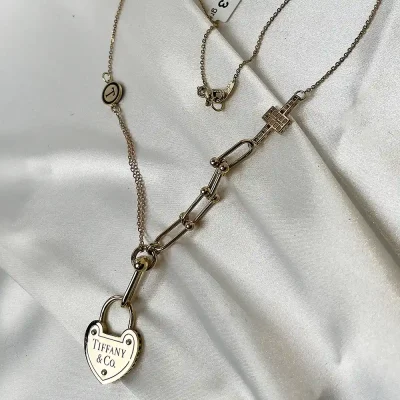 گردنبند طلا زنانه طرح تیفانی با پلاک قلبی 15.13 گرمی عیار 18