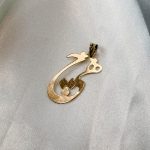 آویز هیچ طلا ۱۸ عیار ۷۰۰ سوت طرح هنری – جواهری زمرد