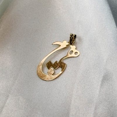 آویز هیچ طلا ۱۸ عیار ۷۰۰ سوت طرح هنری – جواهری زمرد