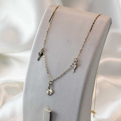 گردنبند طلا کارجور مانیک با وزن ۱.۰۲ گرم از جواهری زمرد